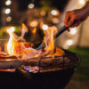 Family,Making,Barbecue,In,Dinner,Party,Camping,At,Night